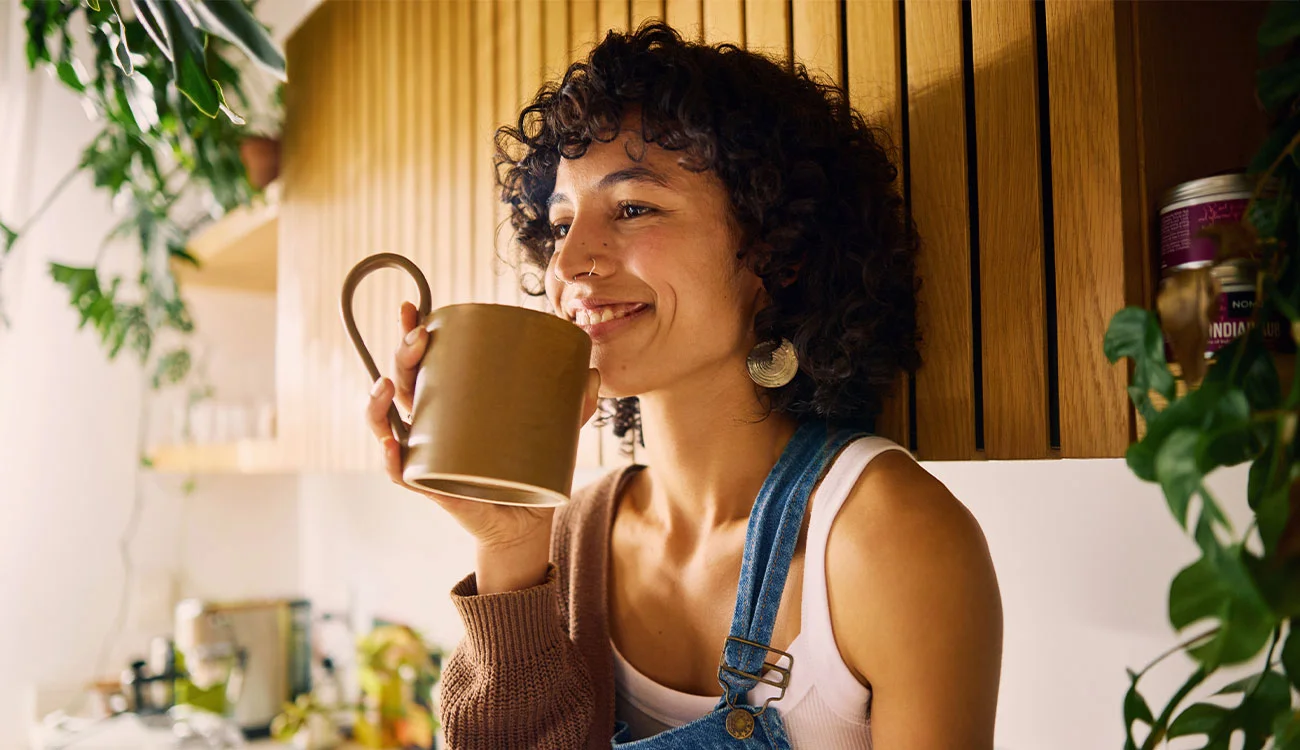 Customer enjoying a coffee at home