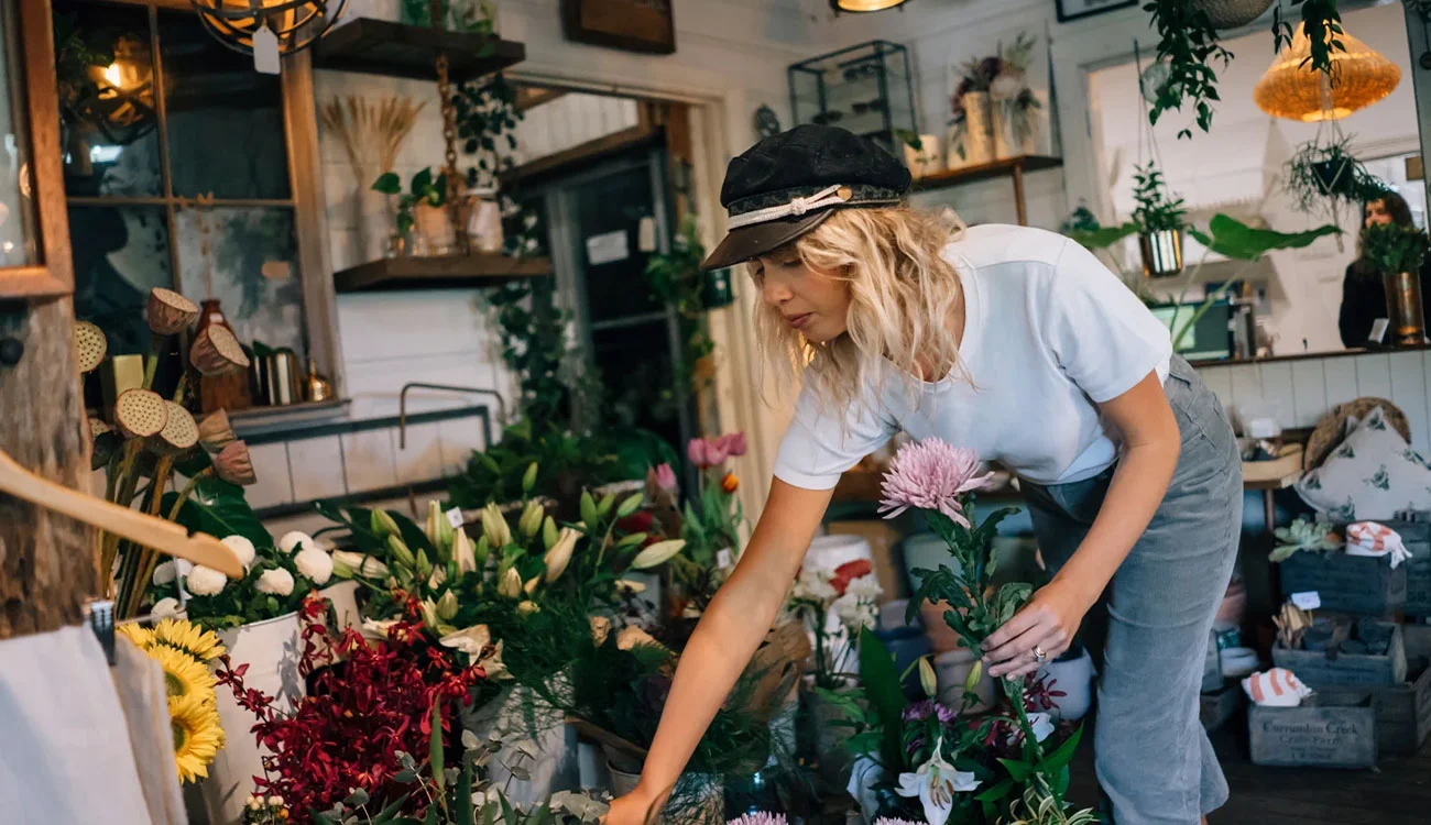Florist arranging flowers